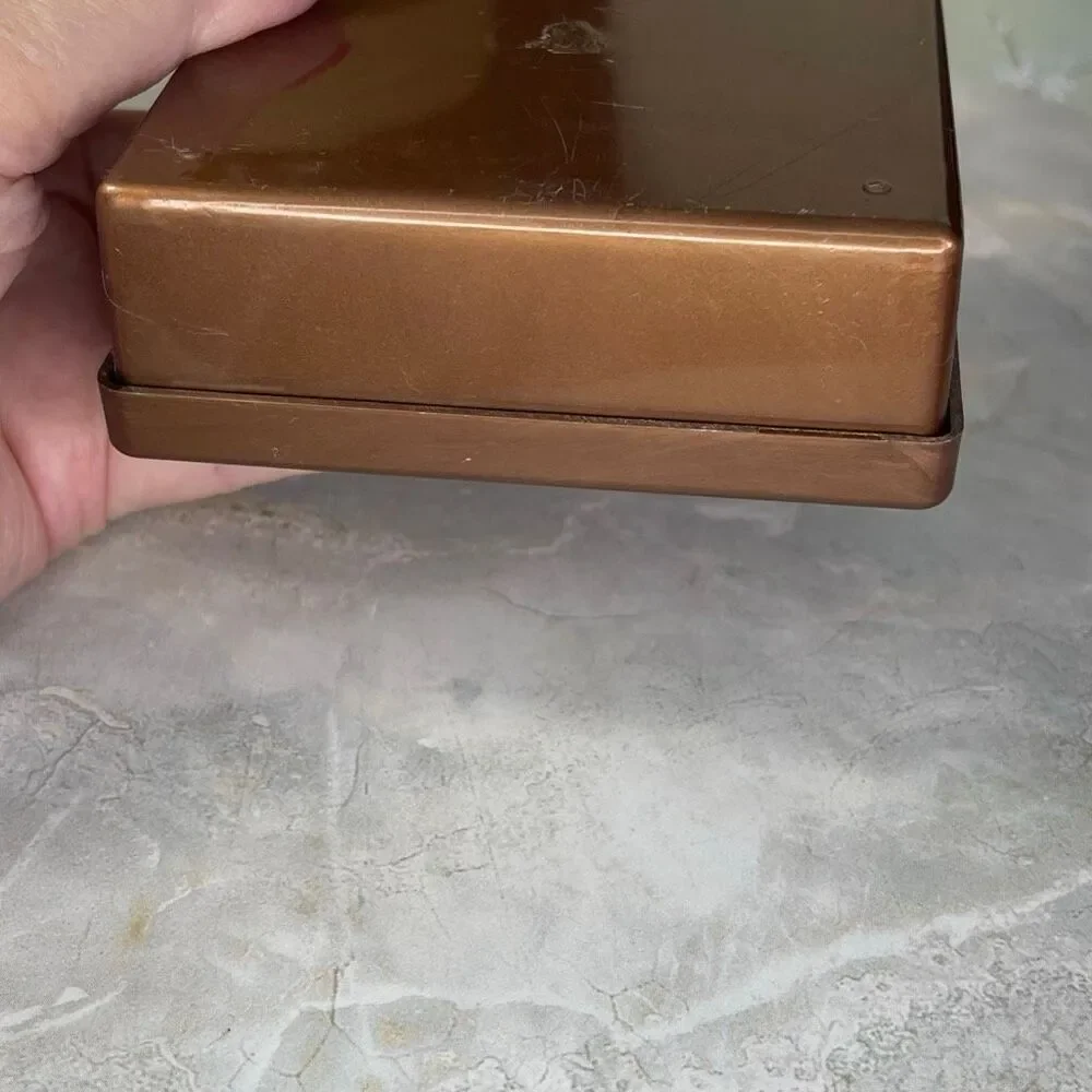 Vintage Midcentury Steeds The Jewel Box coaster set copper colored plastic.